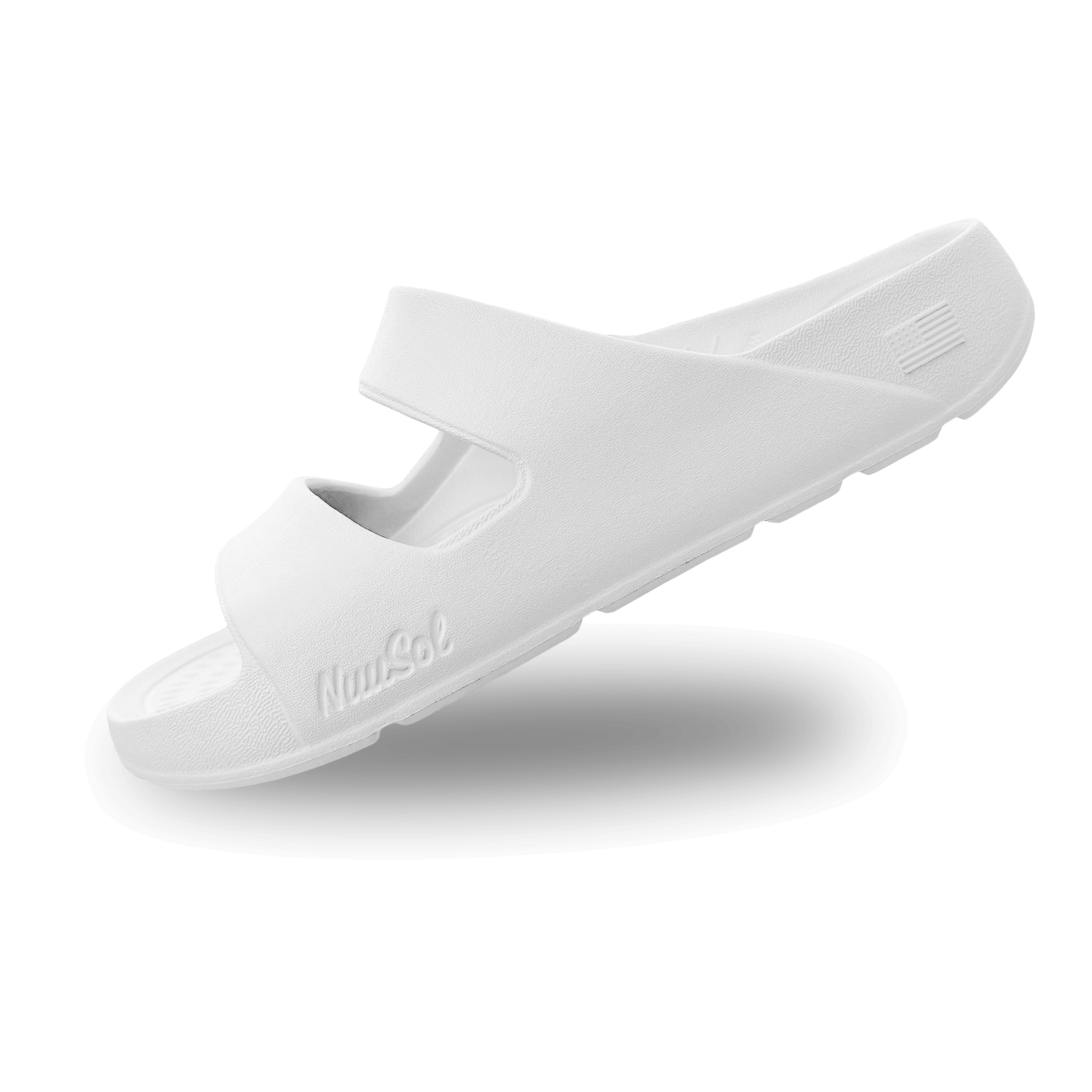 NuuSol Women's Sun Valley Recovery Slide in white, offering comfortable EVASOL foam support for recovery.